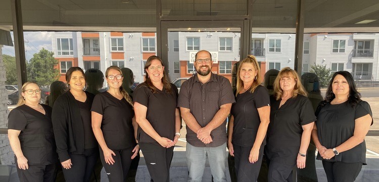 A team photo of a dental team in Huntsville, TX